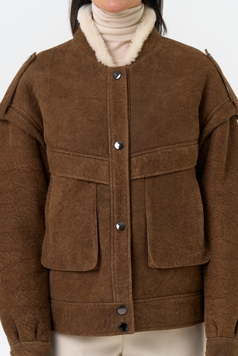 Миниатюра фотографии Женская натуральная дубленка в коричневом цвете