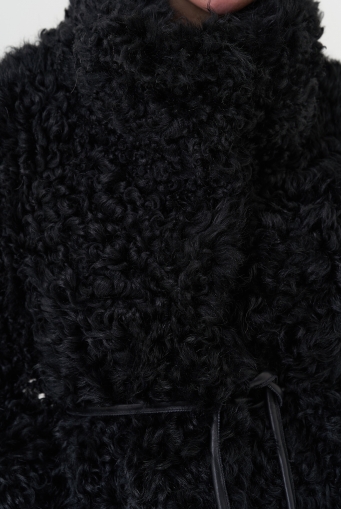 Миниатюра фотографии Двухсторонняя дубленка черного цвета