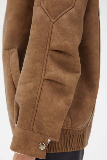 Миниатюра фотографии Женская дубленка из эко кожи с воротником стойкой